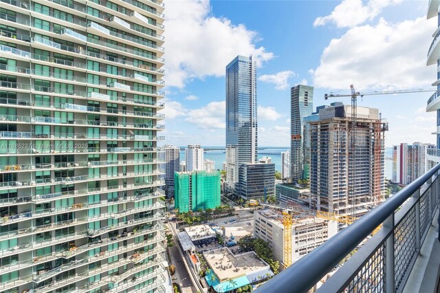 property's view of city with a water view