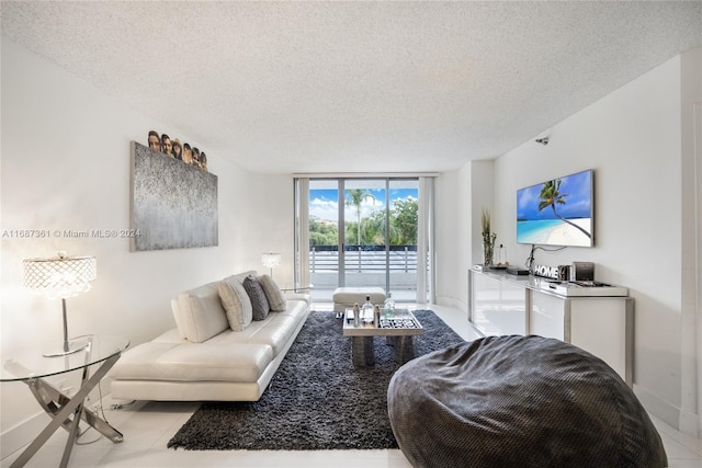 tiled living room with a textured ceiling