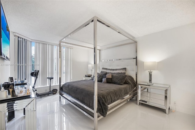 bedroom featuring a textured ceiling