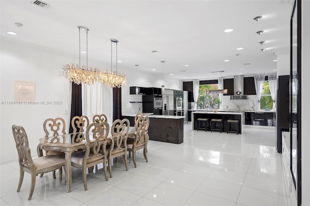 dining room with light tile patterned floors, visible vents, a chandelier, and recessed lighting