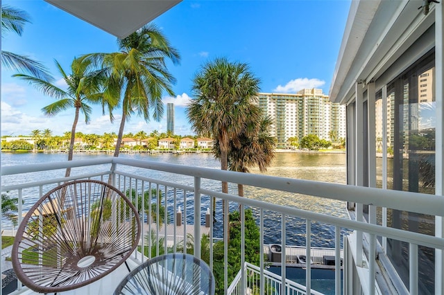 balcony featuring a water view