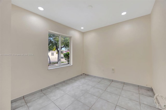 view of tiled spare room