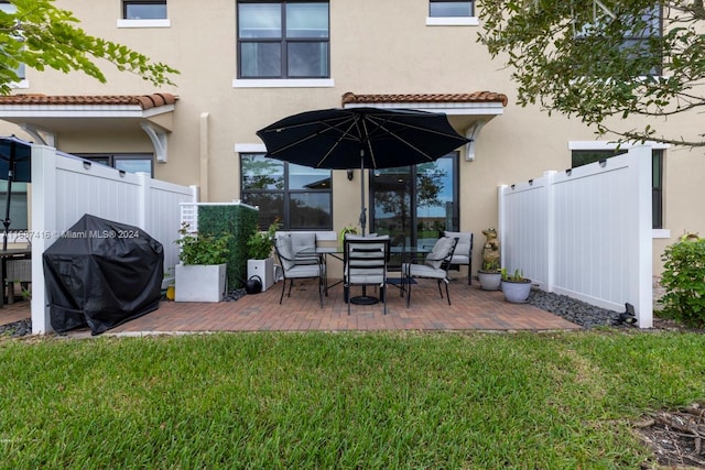 view of patio / terrace featuring a grill