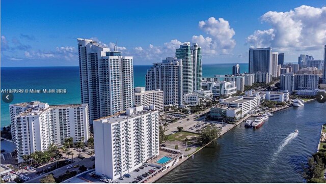 property's view of city with a water view