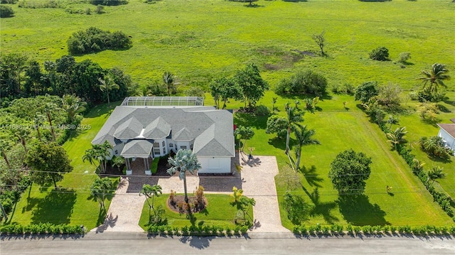 birds eye view of property featuring a rural view