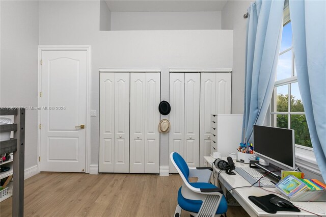 office area with light wood-style flooring