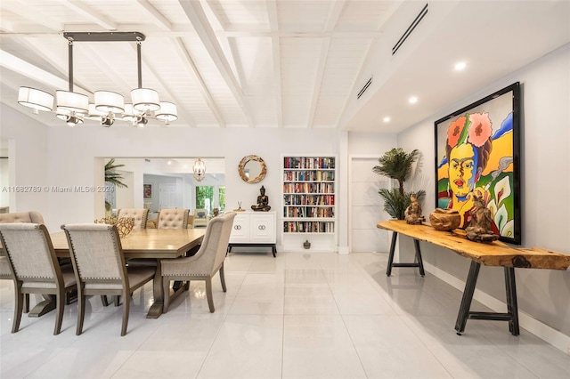 dining room with an inviting chandelier and light tile patterned floors