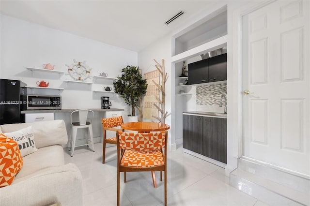 living room featuring light tile patterned floors