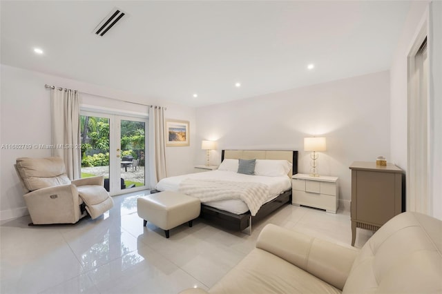 tiled bedroom featuring access to outside and french doors