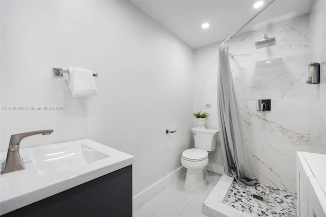 bathroom with walk in shower, vanity, and toilet