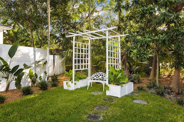 view of outdoor structure featuring a lawn