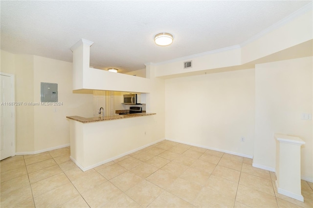 kitchen featuring kitchen peninsula, stainless steel appliances, light tile patterned flooring, electric panel, and a textured ceiling