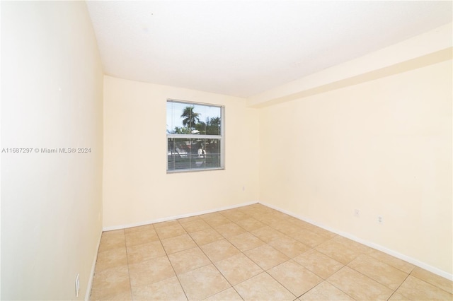 view of tiled spare room