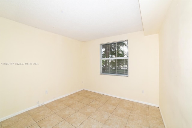 view of tiled spare room