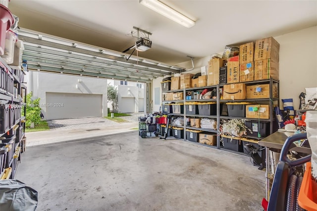 garage featuring a garage door opener