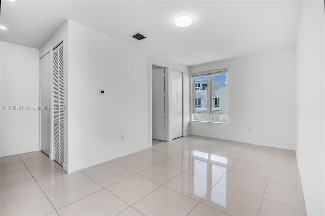 interior space featuring light tile patterned floors