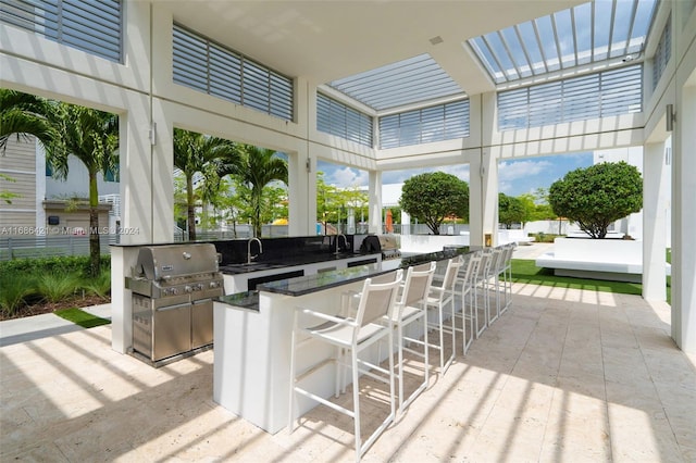 sunroom featuring sink