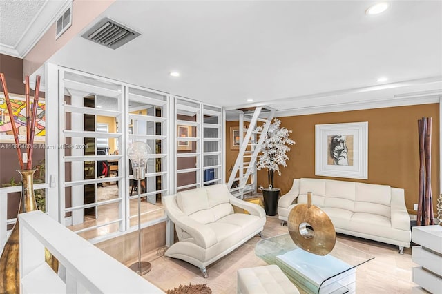 living room featuring ornamental molding