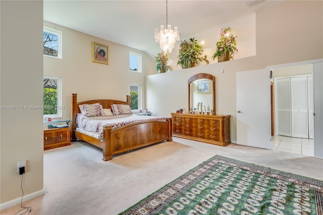 carpeted bedroom featuring multiple windows, high vaulted ceiling, and a notable chandelier