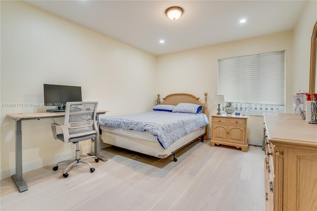 bedroom featuring light hardwood / wood-style floors