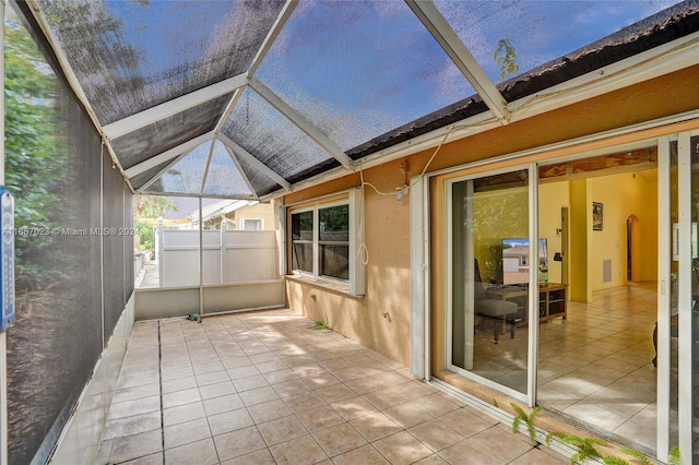 view of patio / terrace with a lanai