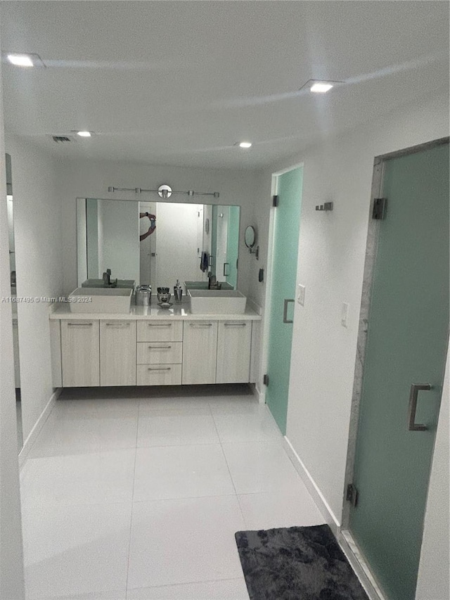 bathroom featuring vanity and tile patterned floors