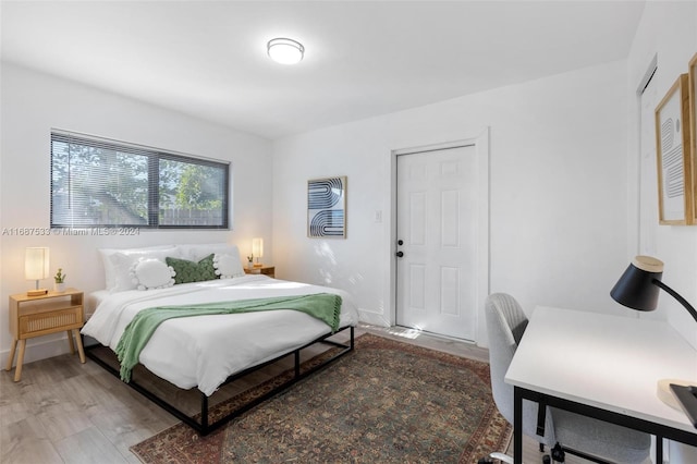 bedroom featuring hardwood / wood-style flooring