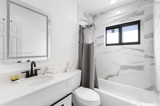 full bathroom featuring vanity, toilet, and shower / tub combo