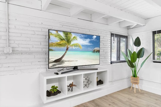 interior details featuring hardwood / wood-style flooring, beamed ceiling, and wooden ceiling