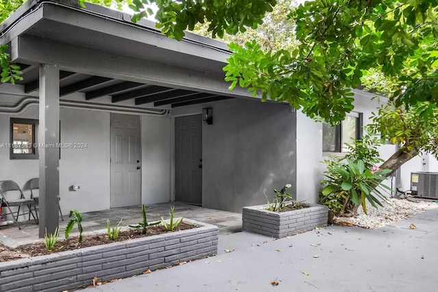 property entrance with cooling unit