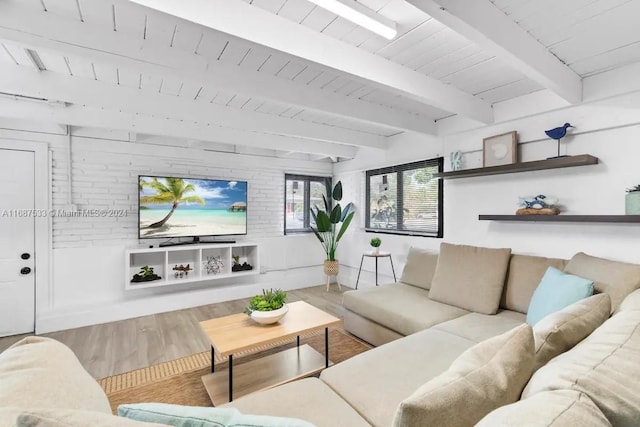 living room with wood ceiling, wood-type flooring, and beamed ceiling