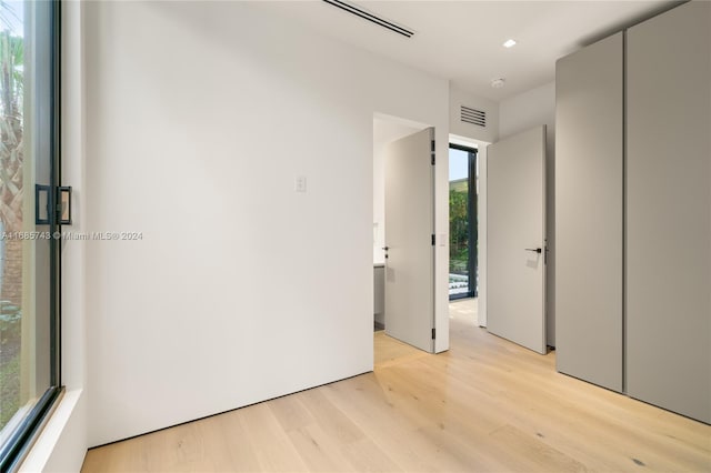 empty room with light wood-type flooring