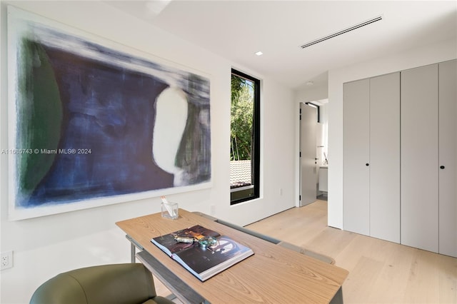 living room with light hardwood / wood-style flooring