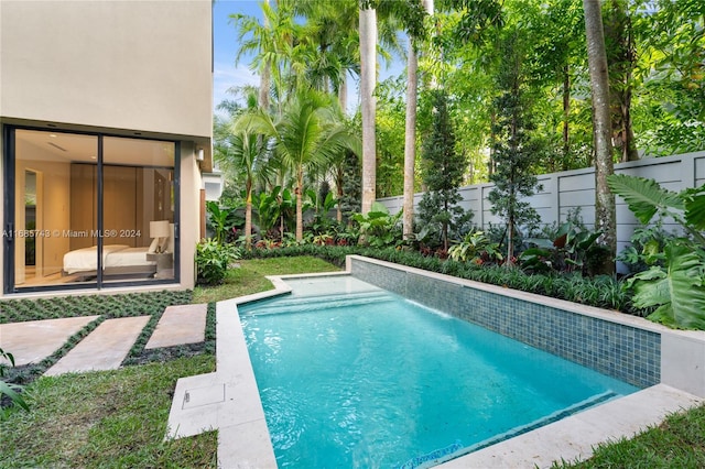 view of pool featuring pool water feature