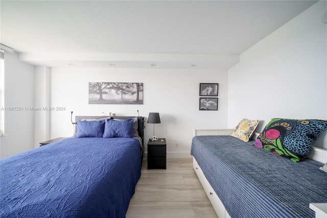 bedroom with light hardwood / wood-style flooring