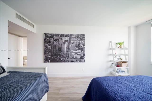 bedroom featuring light wood-type flooring