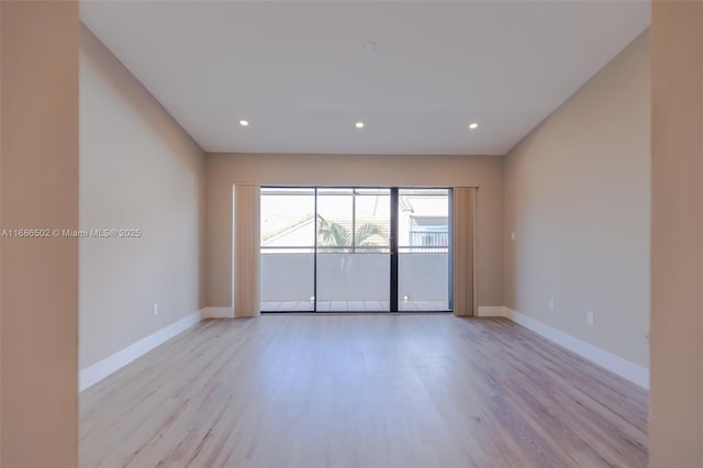 unfurnished room featuring light wood-style floors, recessed lighting, and baseboards