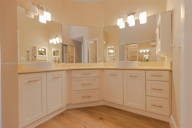 bathroom featuring vanity and wood finished floors