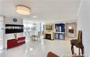 1833 S Ocean Dr Unit Ph1, Hallandale Beach, FL 33009 - living area with a fireplace