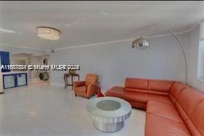 living room featuring tile patterned flooring