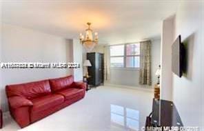 living room featuring a chandelier