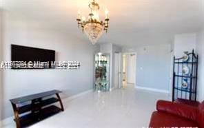 living room featuring a chandelier