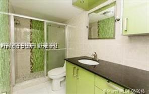1833 S Ocean Dr Unit Ph1, Hallandale Beach, FL 33009 - full bath with vanity and a stall shower