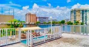 1833 S Ocean Dr Unit Ph1, Hallandale Beach, FL 33009 - view of patio / terrace with a water view and a view of city