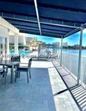 1833 S Ocean Dr Unit Ph1, Hallandale Beach, FL 33009 - view of patio / terrace with a water view