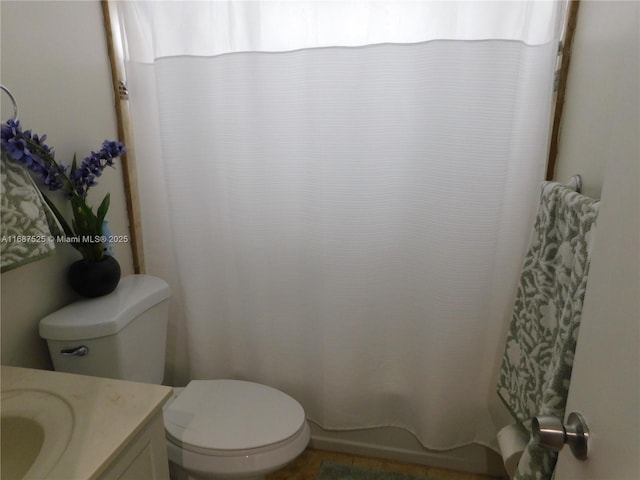 bathroom with vanity and toilet