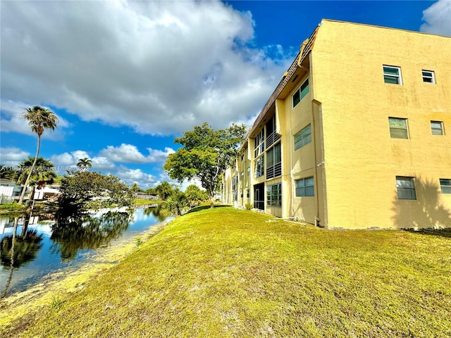 view of property featuring a water view