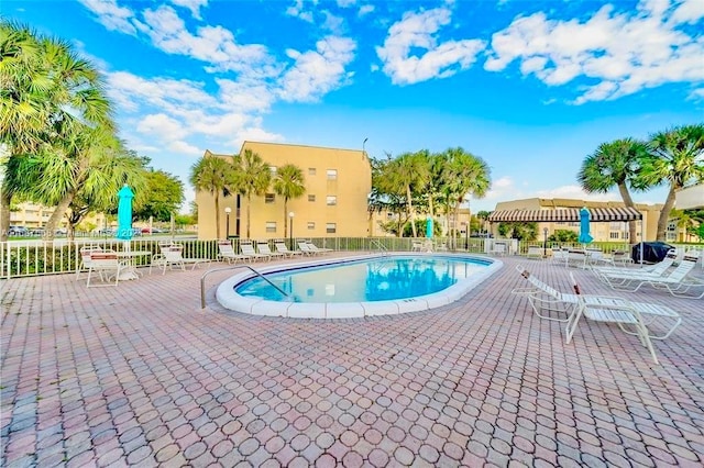 view of pool featuring a patio area