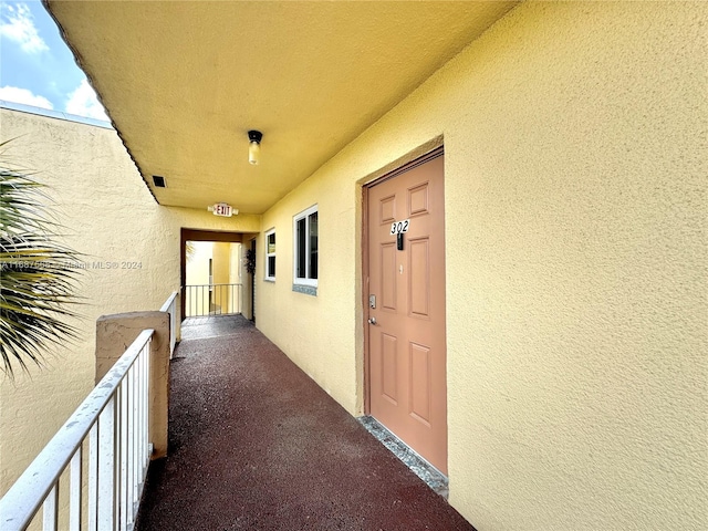 doorway to property with a balcony