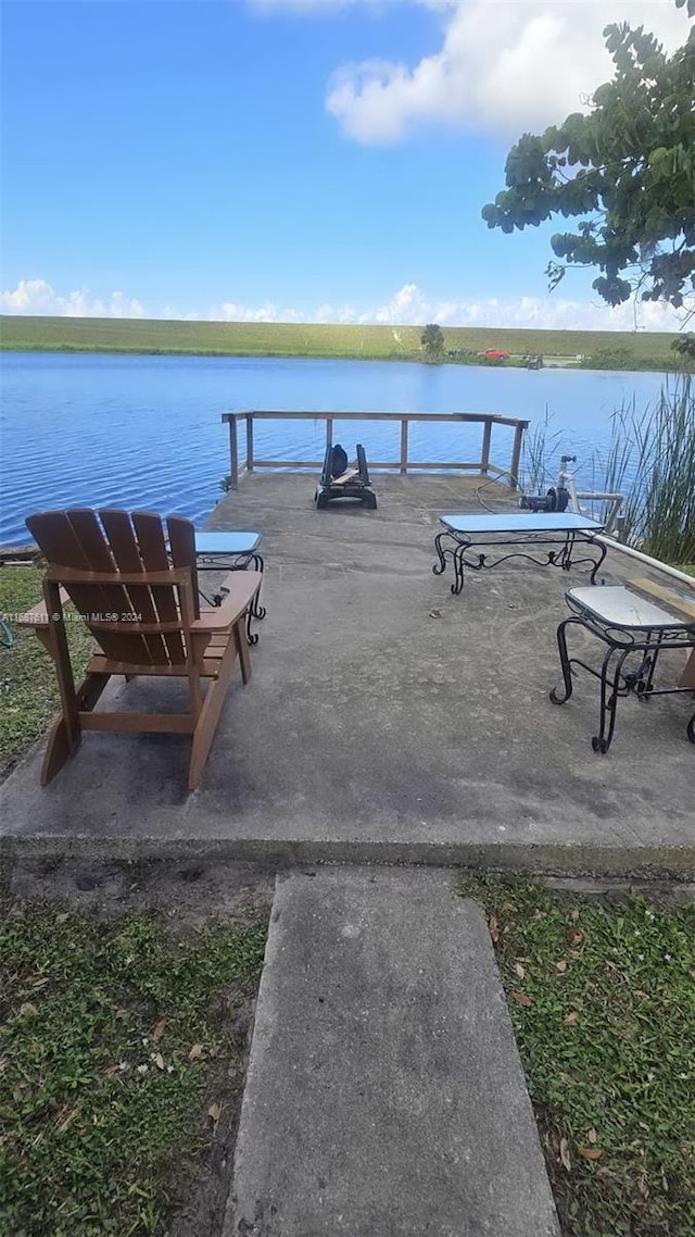 view of dock with a water view